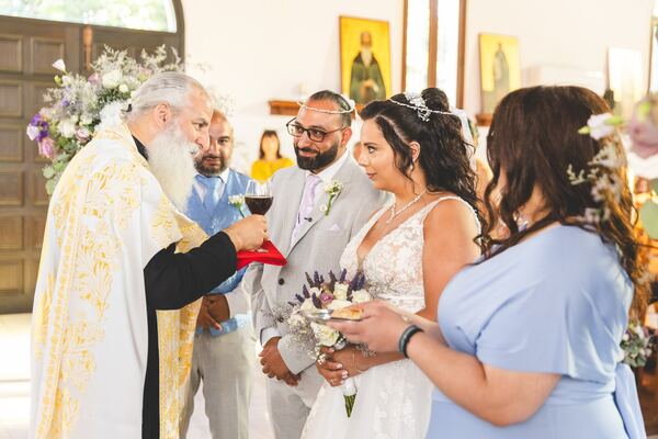 The common cup at a Greek Orthodox wedding at the Church of St Spyridon, Mari, photographed by Evagoras Mandrides