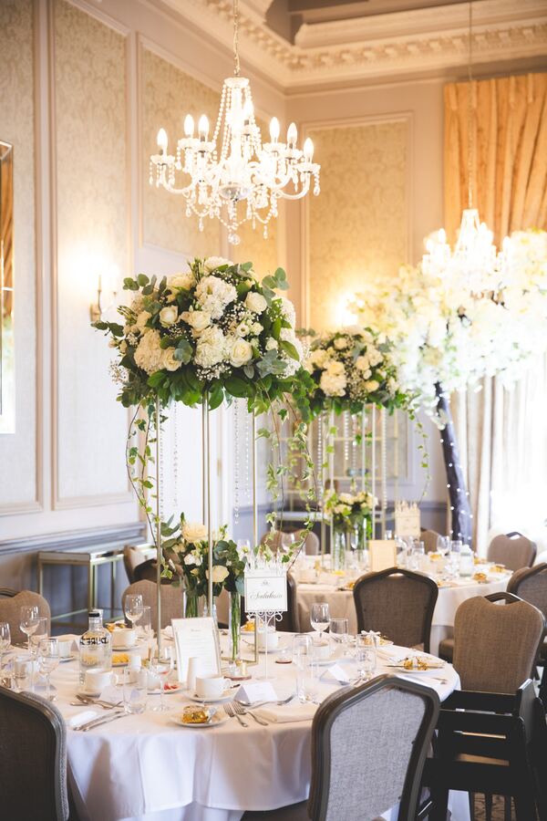 Christening tables and flowers at Down Hall, Essex, photographed by Evagoras Mandrides