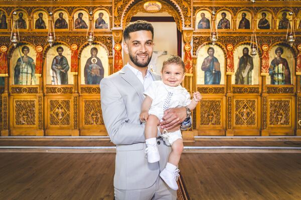 Christening photograph by Evagoras Mandrides, christening photographer in North London