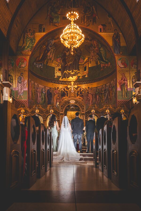A Greek Orthodox wedding ceremony in a North London church, photographed by Evagoras Mandrides