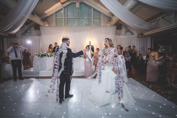 The money dance at a Greek Cypriot wedding in Hertfordshire, photographed by Evagoras Mandrides
