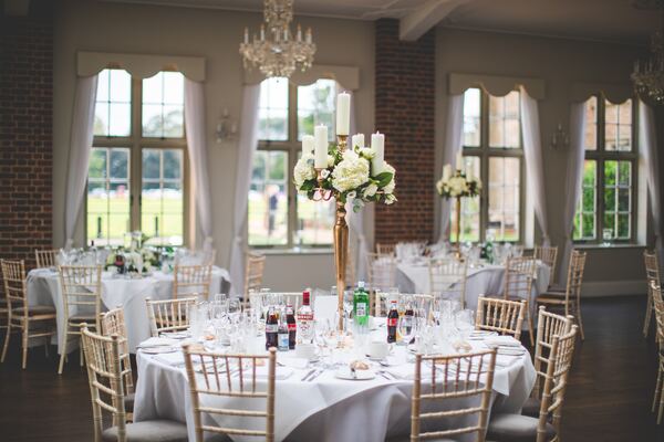 Tables set for a wedding at Offley Place, Great Offley, photographed by Evagoras Mandrides