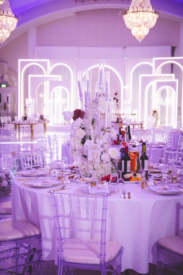 Wedding reception tables and decor at a North London venue, photographed by Evagoras Mandrides