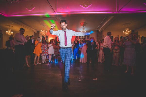 Dancing at a wedding reception at Offley Place, Hertfordshire, photographed by Evagoras Mandrides