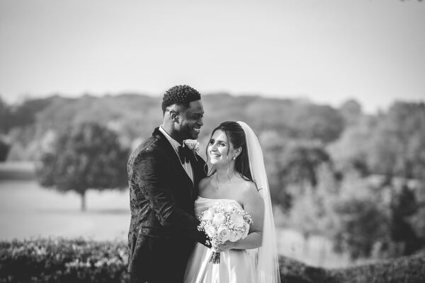 Bride and groom in the grounds of Stock Brook Country Club, Billericay, photographed by Evagoras Mandrides